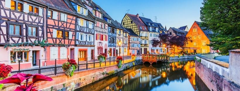 Image of a French town at night. France is a popular destination for young professionals leaving the UK before Brexit.