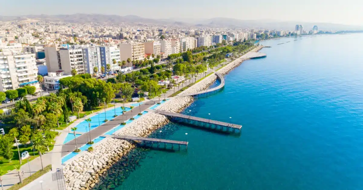 Aerial view of the bustling Limassol coastal promenade, a prime location in Southern Cyprus's booming real estate market for apartments and houses.