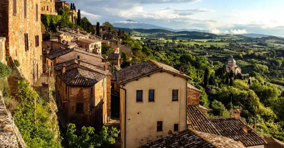 A rustic village nestled in the rolling hills of the Tuscan countryside, an ideal location for a retirement home with excellent transport links and property management services.